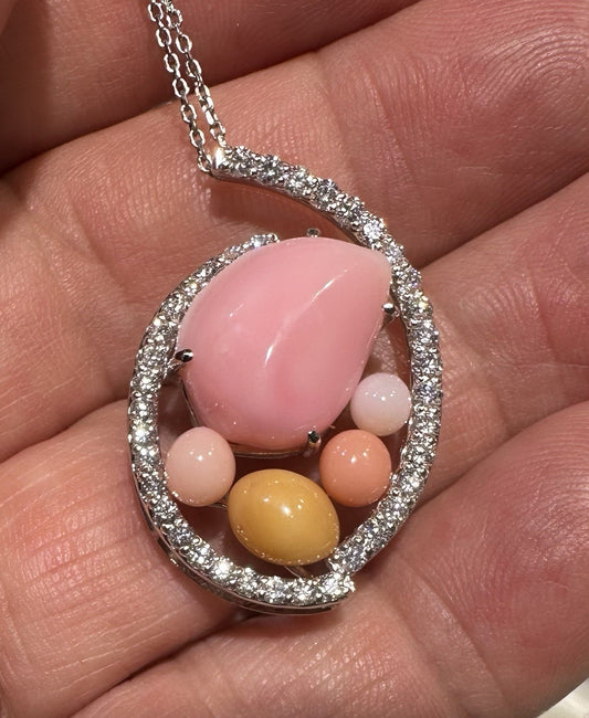 A Magnificent 14.22ct Conch Pearl & Diamond Platinum Pendant