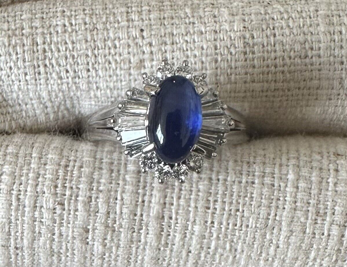 An Unheated Burma 1.46ct Blue Cabochon Sapphire & Diamond Ring