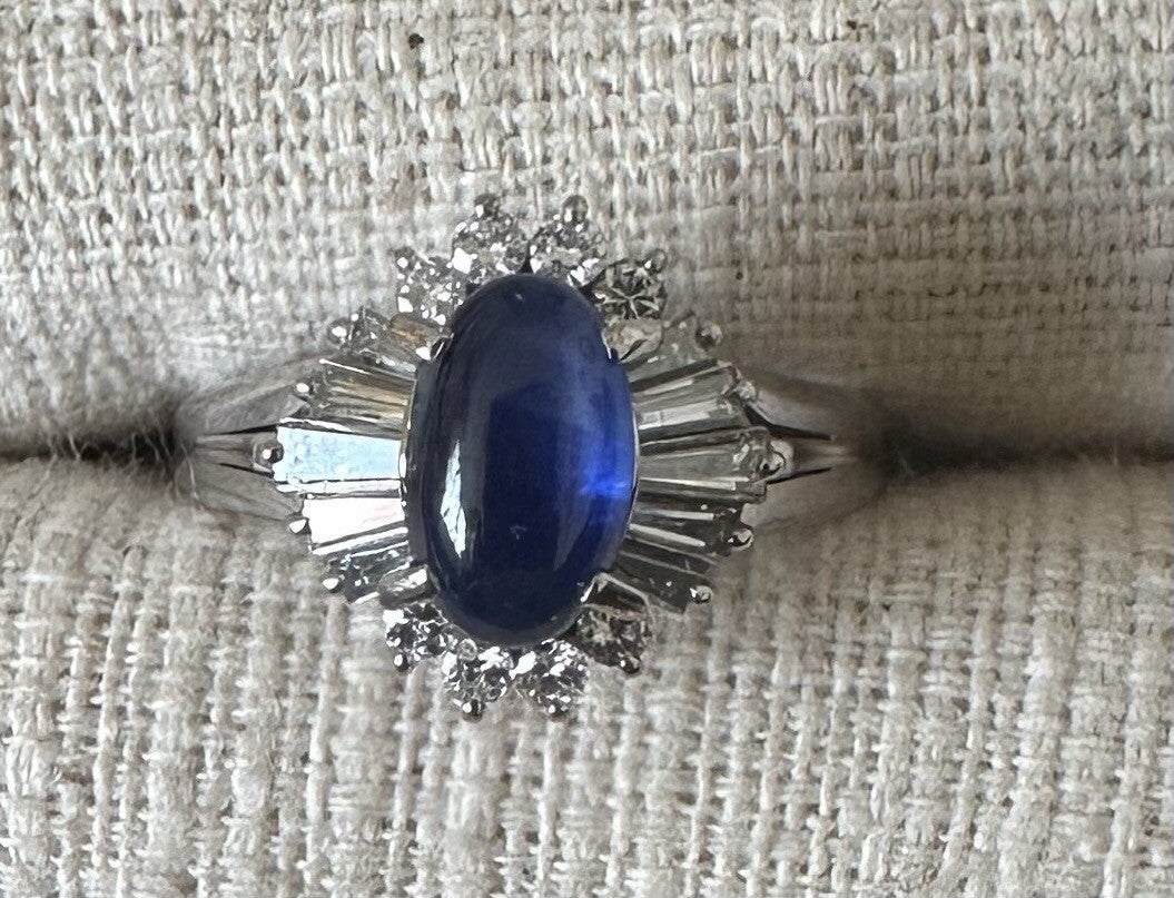 An Unheated Burma 1.46ct Blue Cabochon Sapphire & Diamond Ring