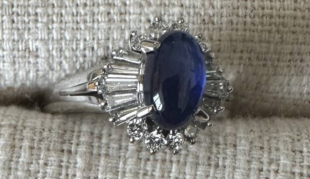 An Unheated Burma 1.46ct Blue Cabochon Sapphire & Diamond Ring