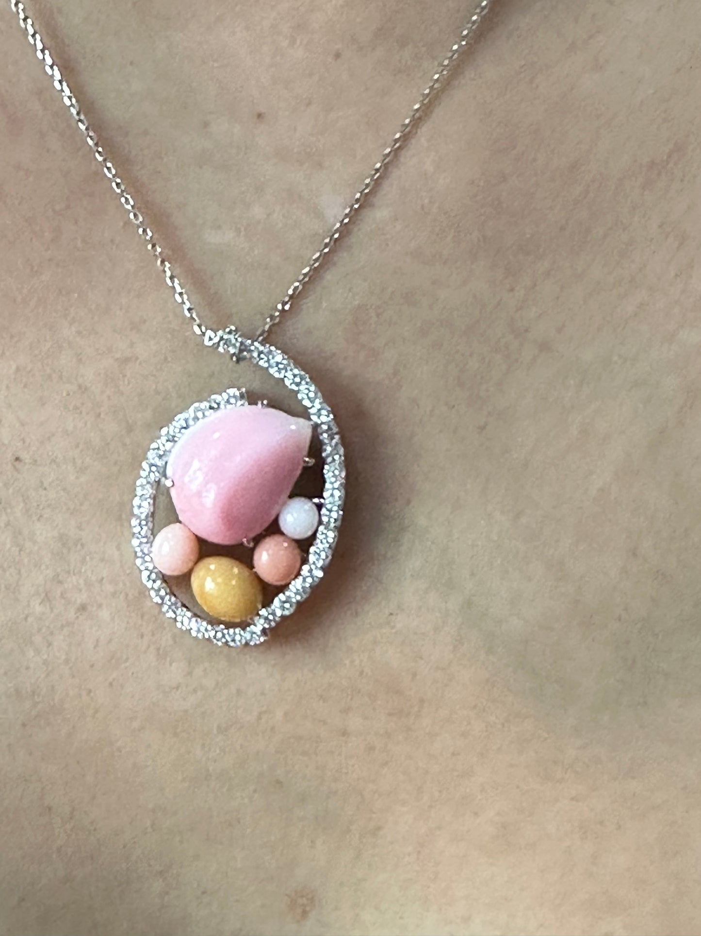 A Magnificent 14.22ct Conch Pearl & Diamond Platinum Pendant