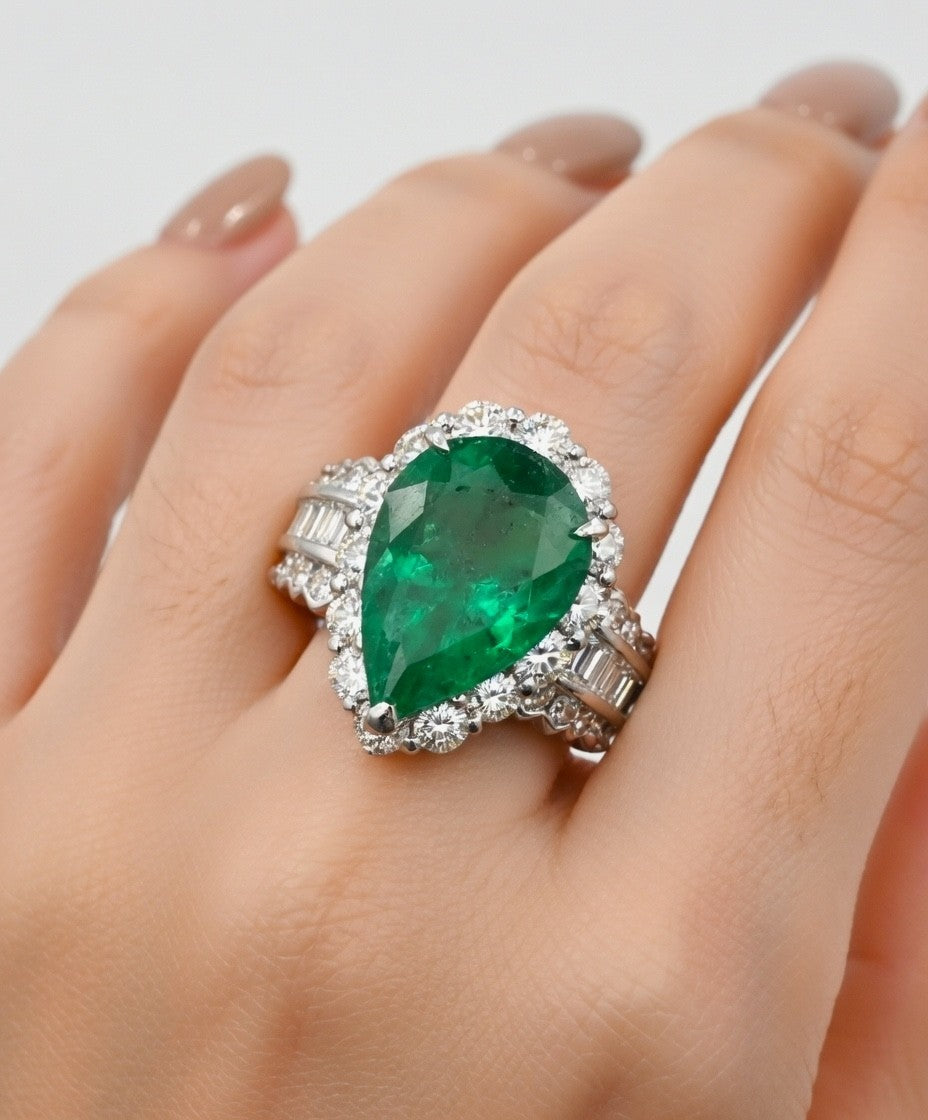 A Superb 6.30ct Muzo Colombia Emerald & Diamond Ring