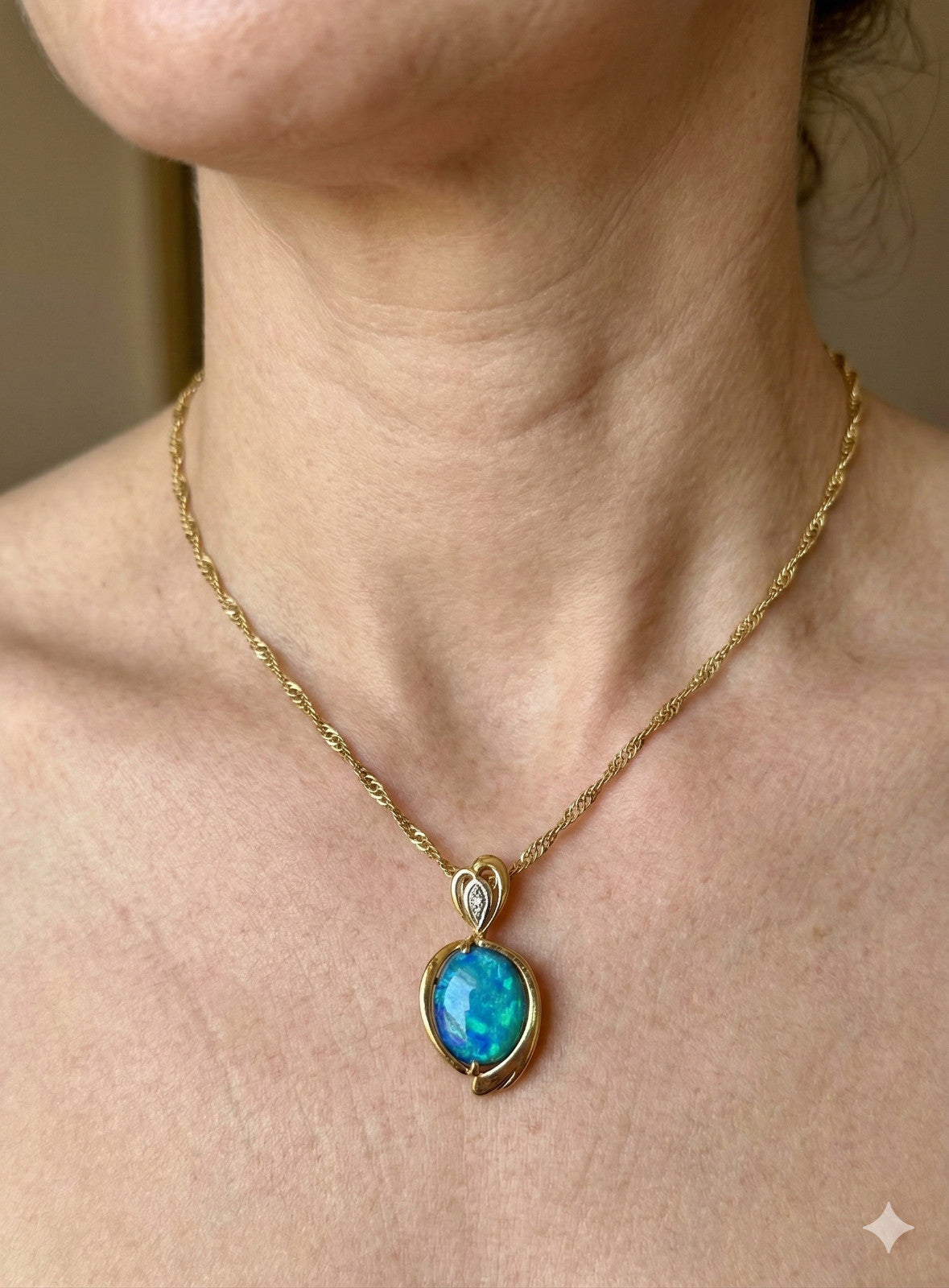 An Exquisite Australian Black Opal & Diamond 18k Pendant