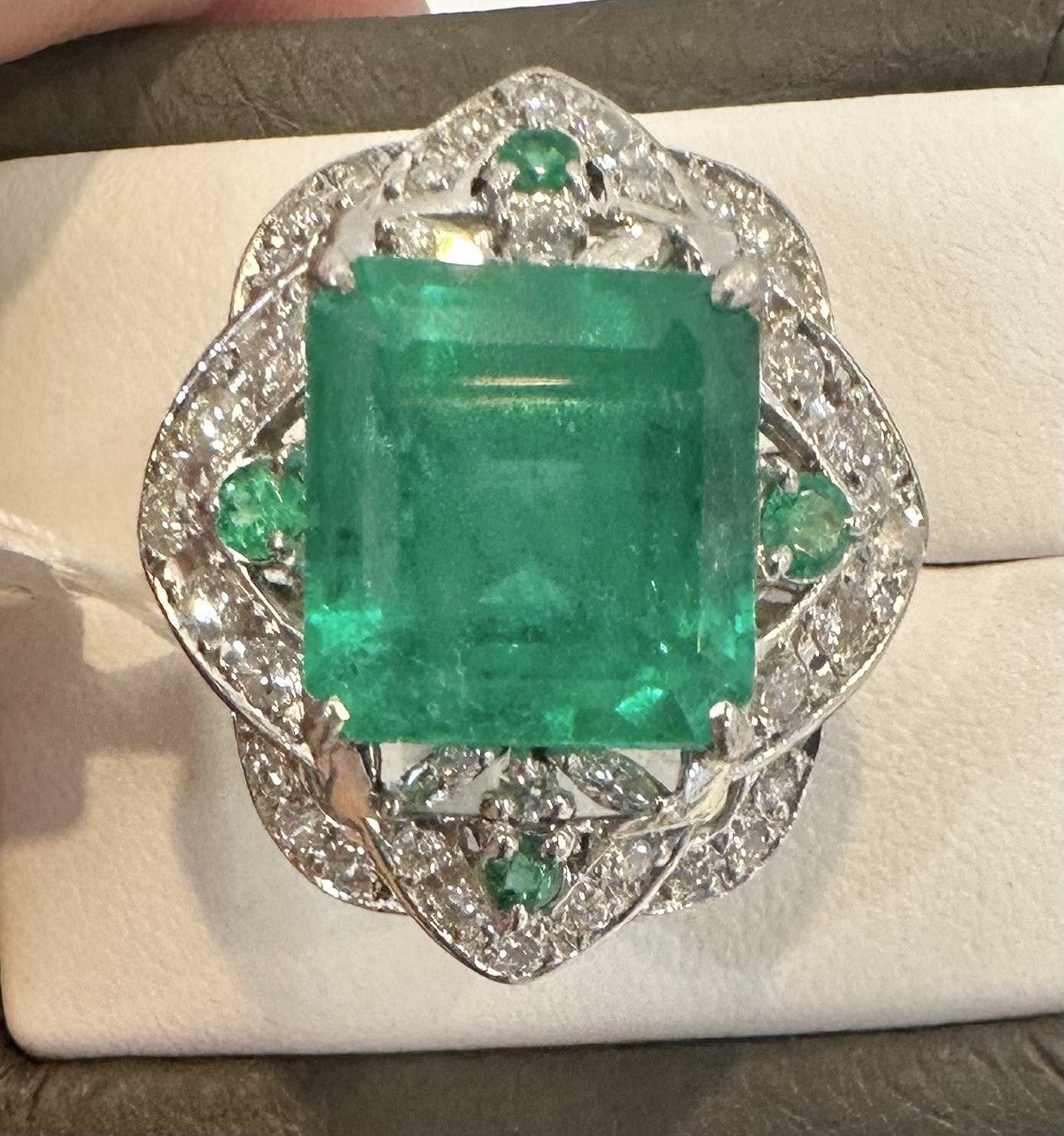 An Extraordinary 11.10ct Colombia Emerald & Diamond Platinum Ring