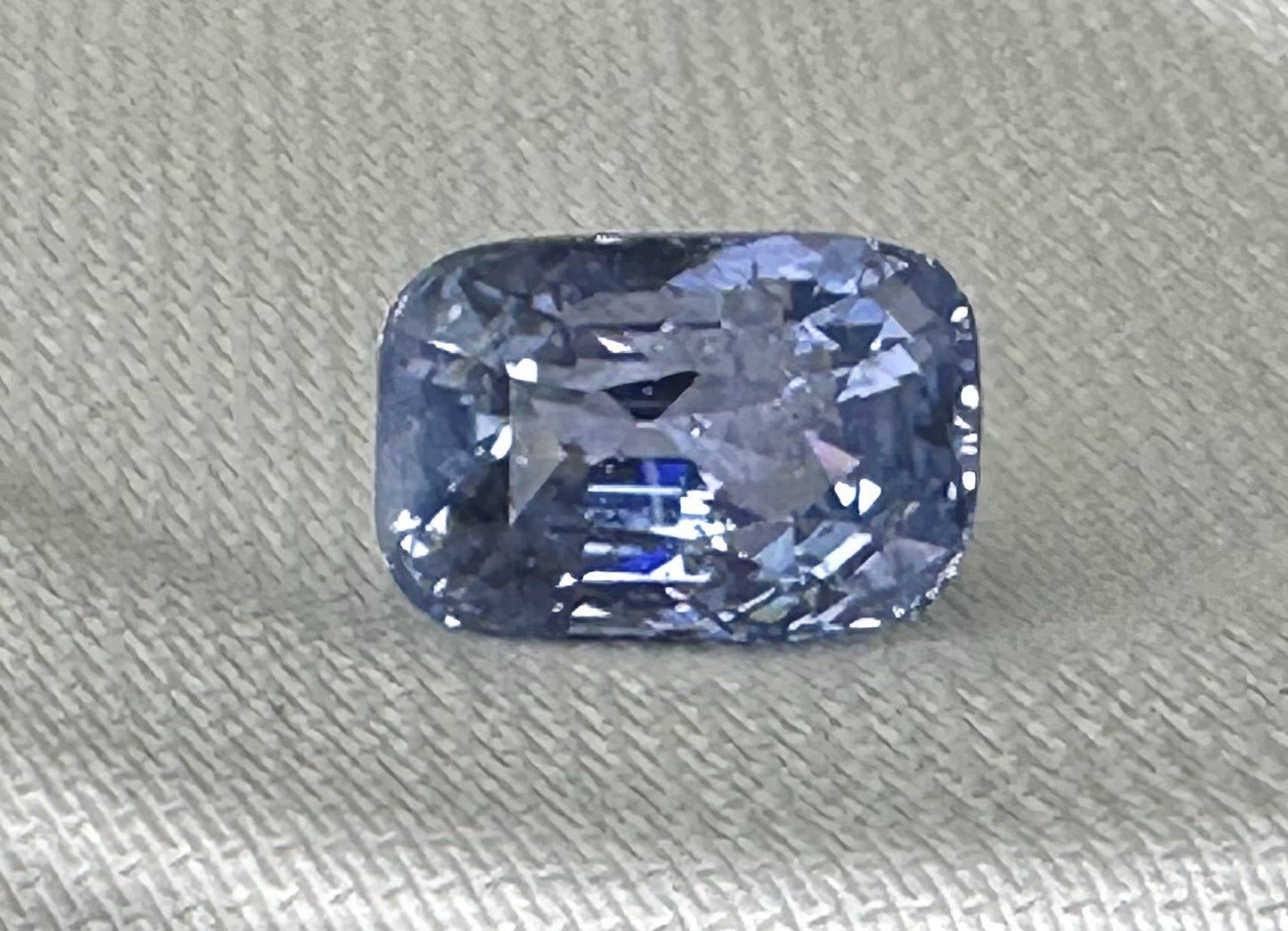 A Stunning Unheated 24.47ct Sri Lankan Violet Blue Sapphire