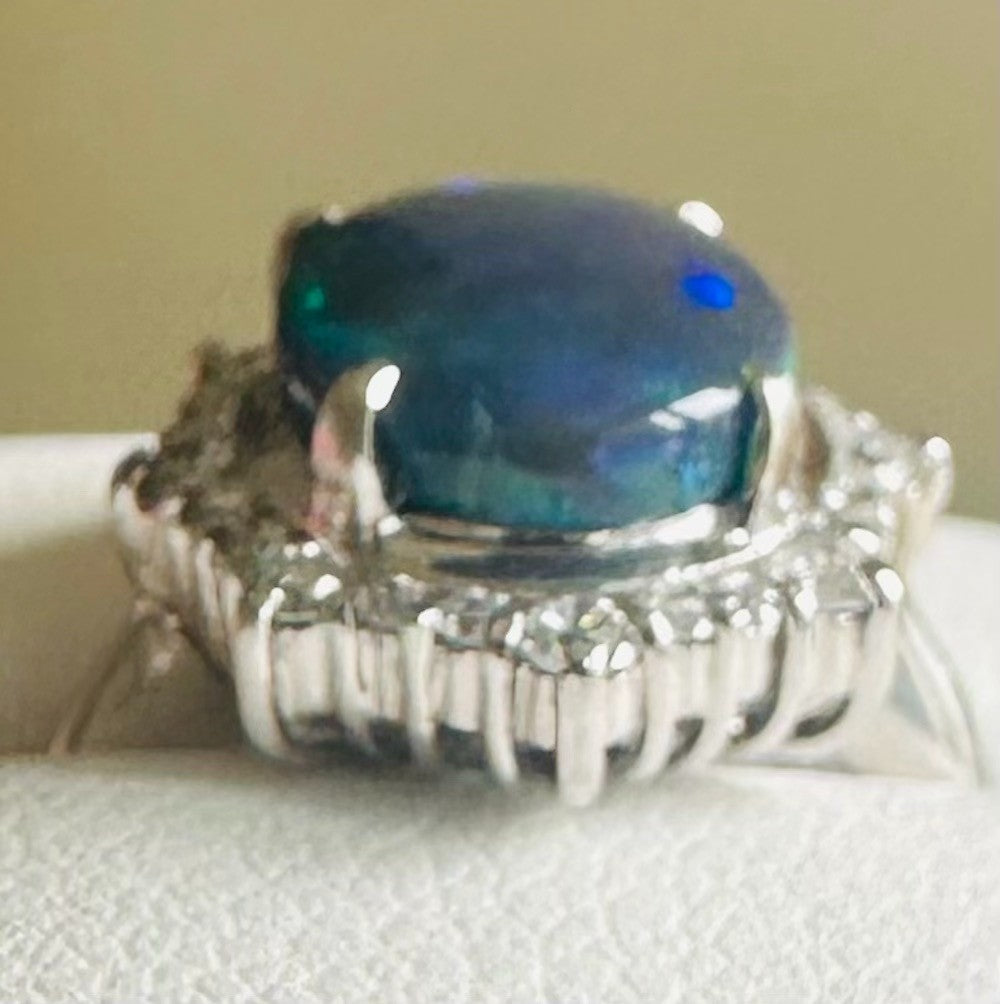 An Exquisite 2.35ct Australian Black Opal & Diamond Platinum Ring