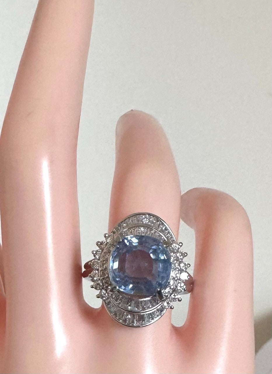 An Impressive Unheated 7.52ct Light Blue Sapphire Platinum & Diamond Ring