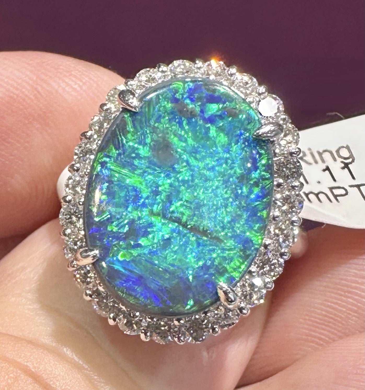A Magnificent 6.25ct Australian Black Opal & Diamond Platinum Ring