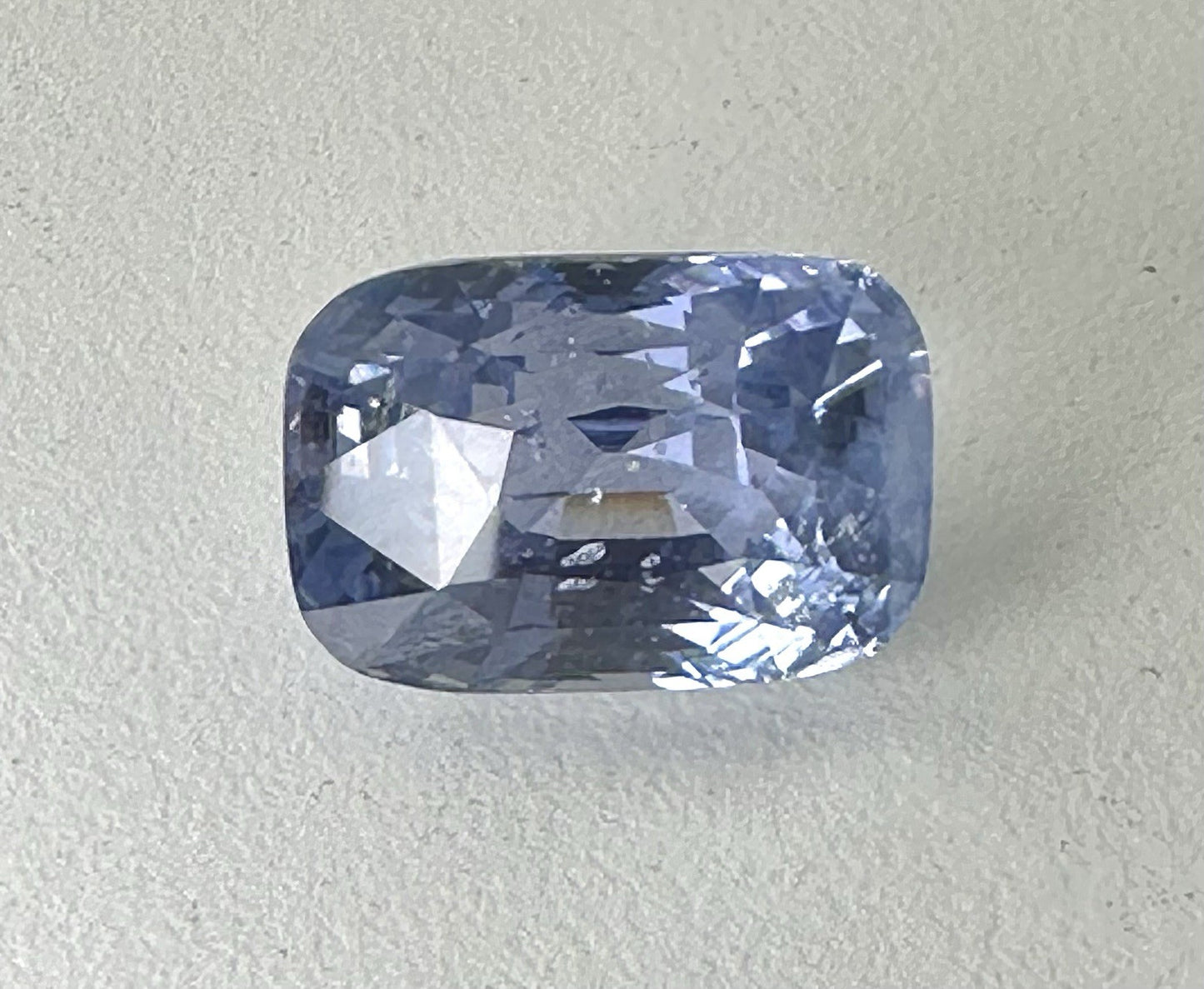 A Stunning Unheated 24.47ct Sri Lankan Violet Blue Sapphire