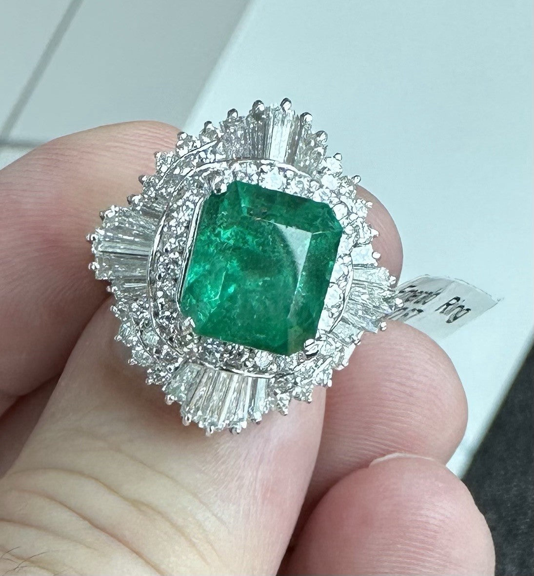 A Superb 4.43ct Colombia Emerald & Diamond Ring