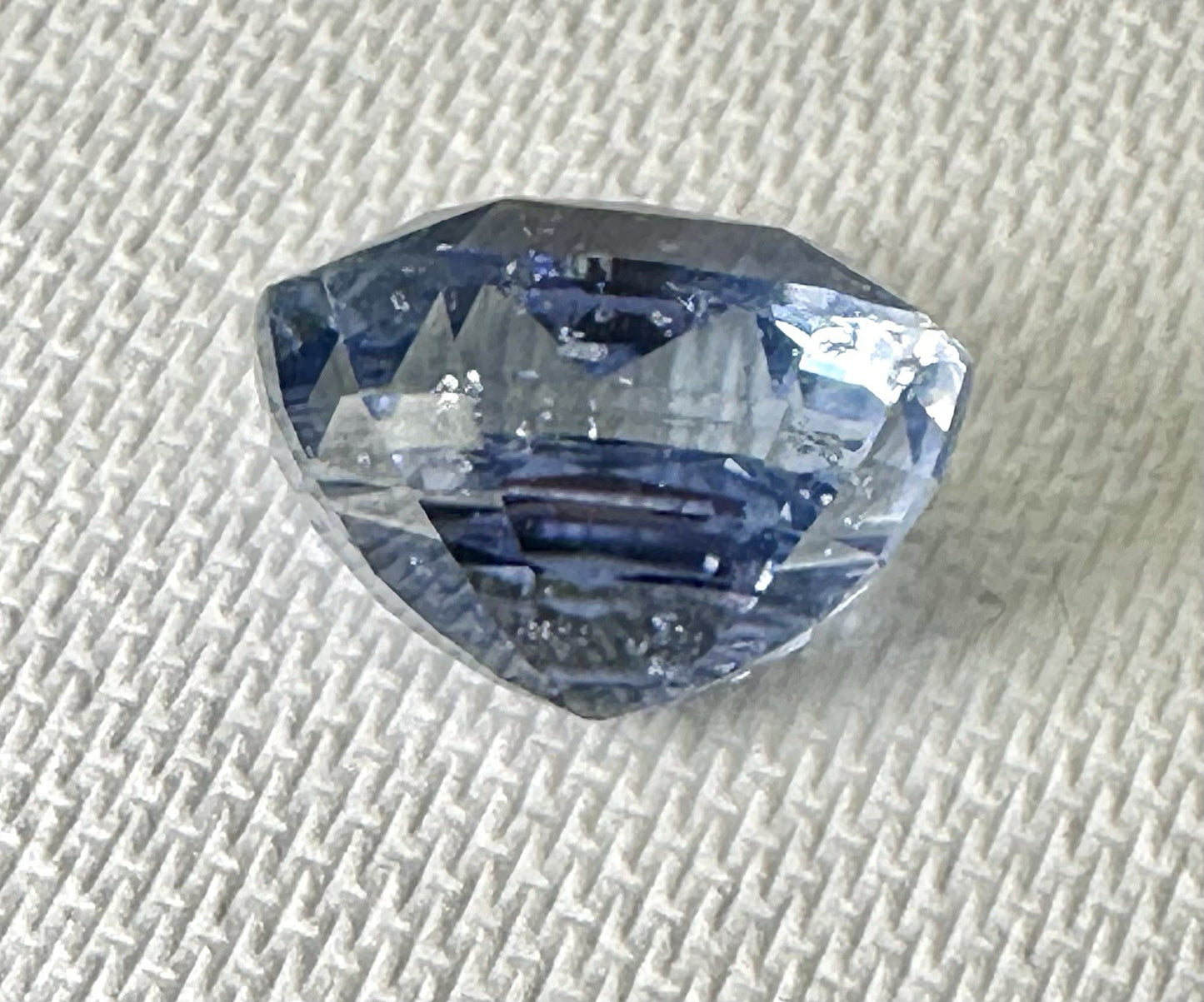 A Stunning Unheated 24.47ct Sri Lankan Violet Blue Sapphire
