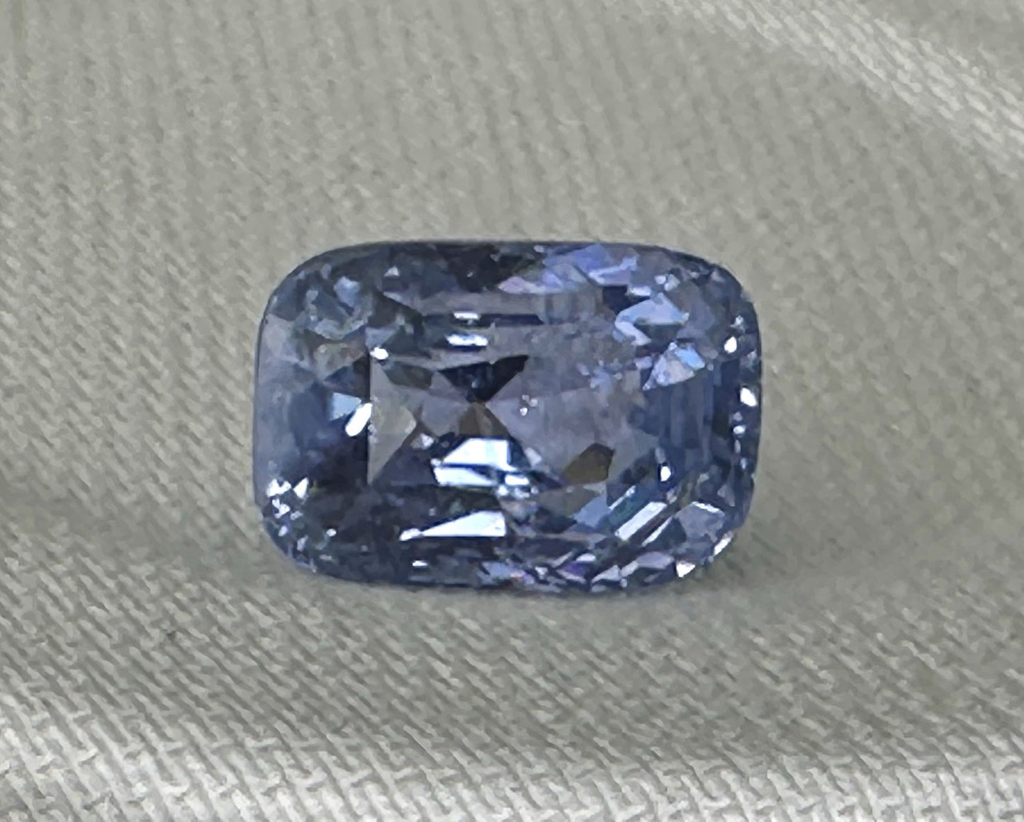 A Stunning Unheated 24.47ct Sri Lankan Violet Blue Sapphire