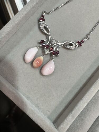 An Exquisite Conch Pearl & Ruby Platinum Necklace