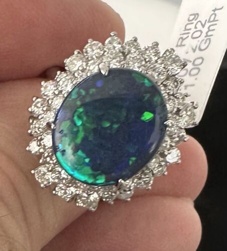 A Magnificent 6.50ct Australian Black Opal & Diamond Platinum Ring