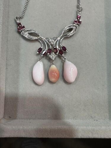 An Exquisite Conch Pearl & Ruby Platinum Necklace