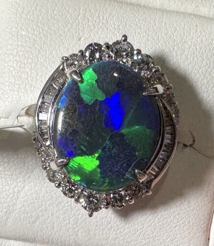 A Magnificent 6.43ct Australian Black Opal & Diamond Platinum Ring