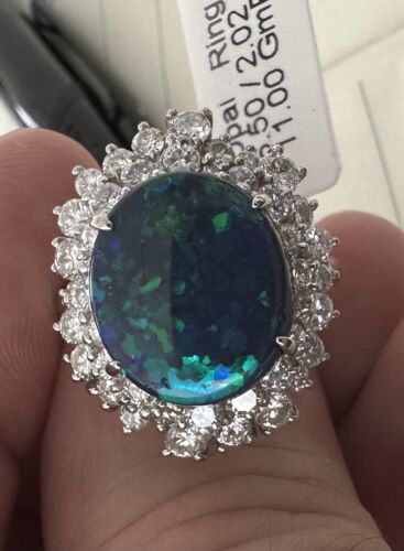 A Magnificent 6.50ct Australian Black Opal & Diamond Platinum Ring