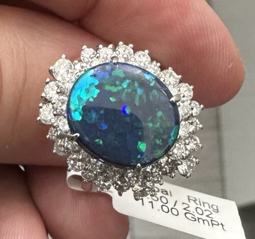 A Magnificent 6.50ct Australian Black Opal & Diamond Platinum Ring