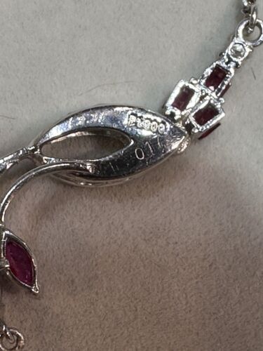 An Exquisite Conch Pearl & Ruby Platinum Necklace