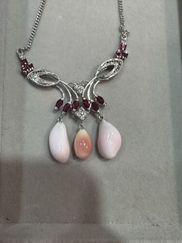 An Exquisite Conch Pearl & Ruby Platinum Necklace