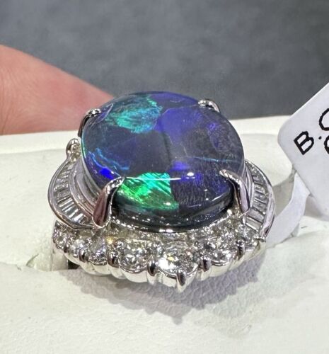 A Magnificent 6.43ct Australian Black Opal & Diamond Platinum Ring