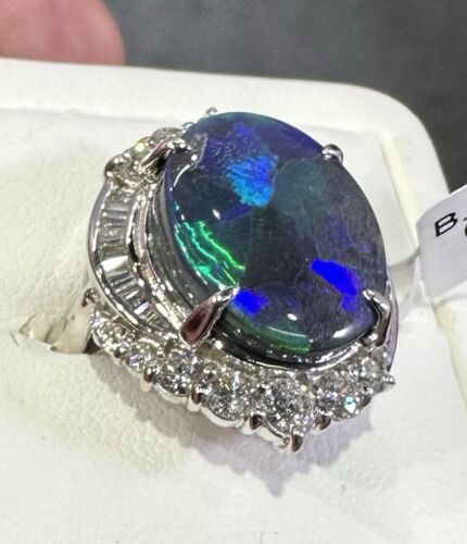 A Magnificent 6.43ct Australian Black Opal & Diamond Platinum Ring