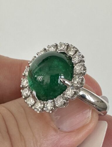 A Beautiful 9.65ct Colombia Emerald & Diamond Platinum Ring