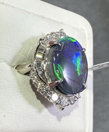 A Magnificent 6.43ct Australian Black Opal & Diamond Platinum Ring