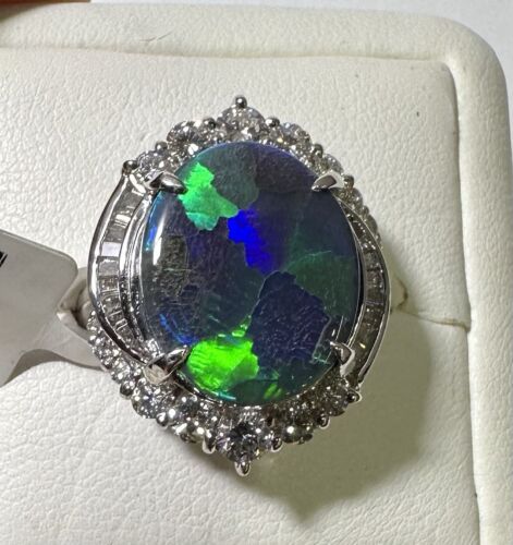 A Magnificent 6.43ct Australian Black Opal & Diamond Platinum Ring