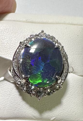 A Magnificent 6.43ct Australian Black Opal & Diamond Platinum Ring