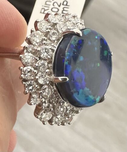 A Magnificent 6.50ct Australian Black Opal & Diamond Platinum Ring