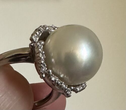 An Immense 14.3mm South Sea cultured pearl diamond platinum ring