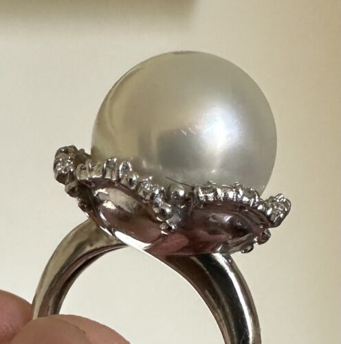 An Immense 14.3mm South Sea cultured pearl diamond platinum ring