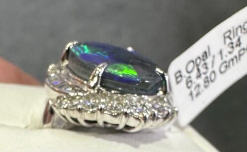 A Magnificent 6.43ct Australian Black Opal & Diamond Platinum Ring