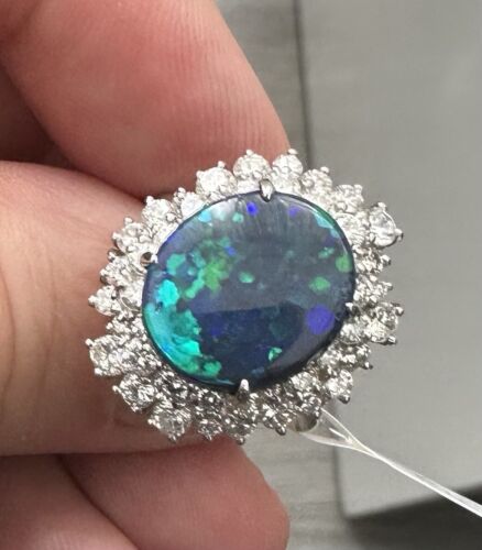 A Magnificent 6.50ct Australian Black Opal & Diamond Platinum Ring