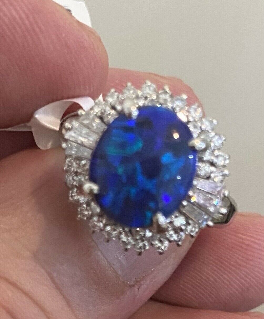 An Exquisite 2.75ct Australian Black Opal & Diamond Platinum Ring