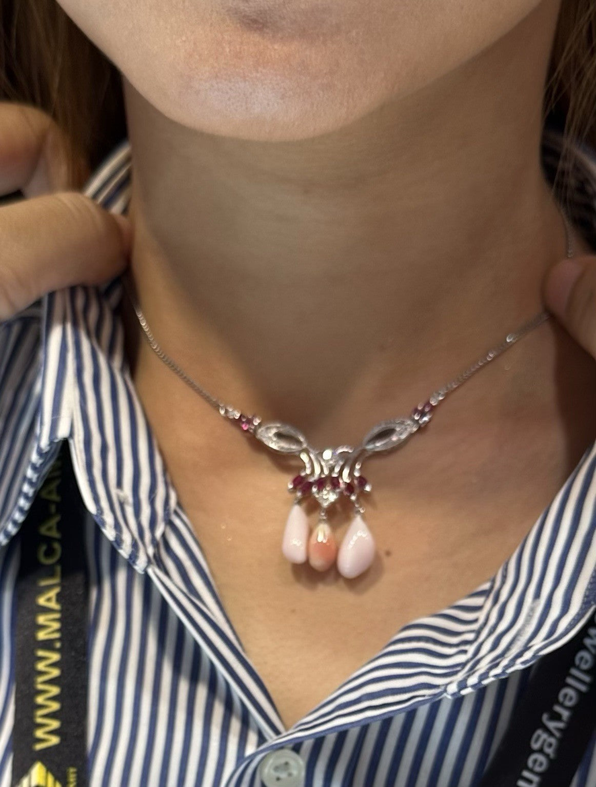 An Exquisite Conch Pearl & Ruby Platinum Necklace