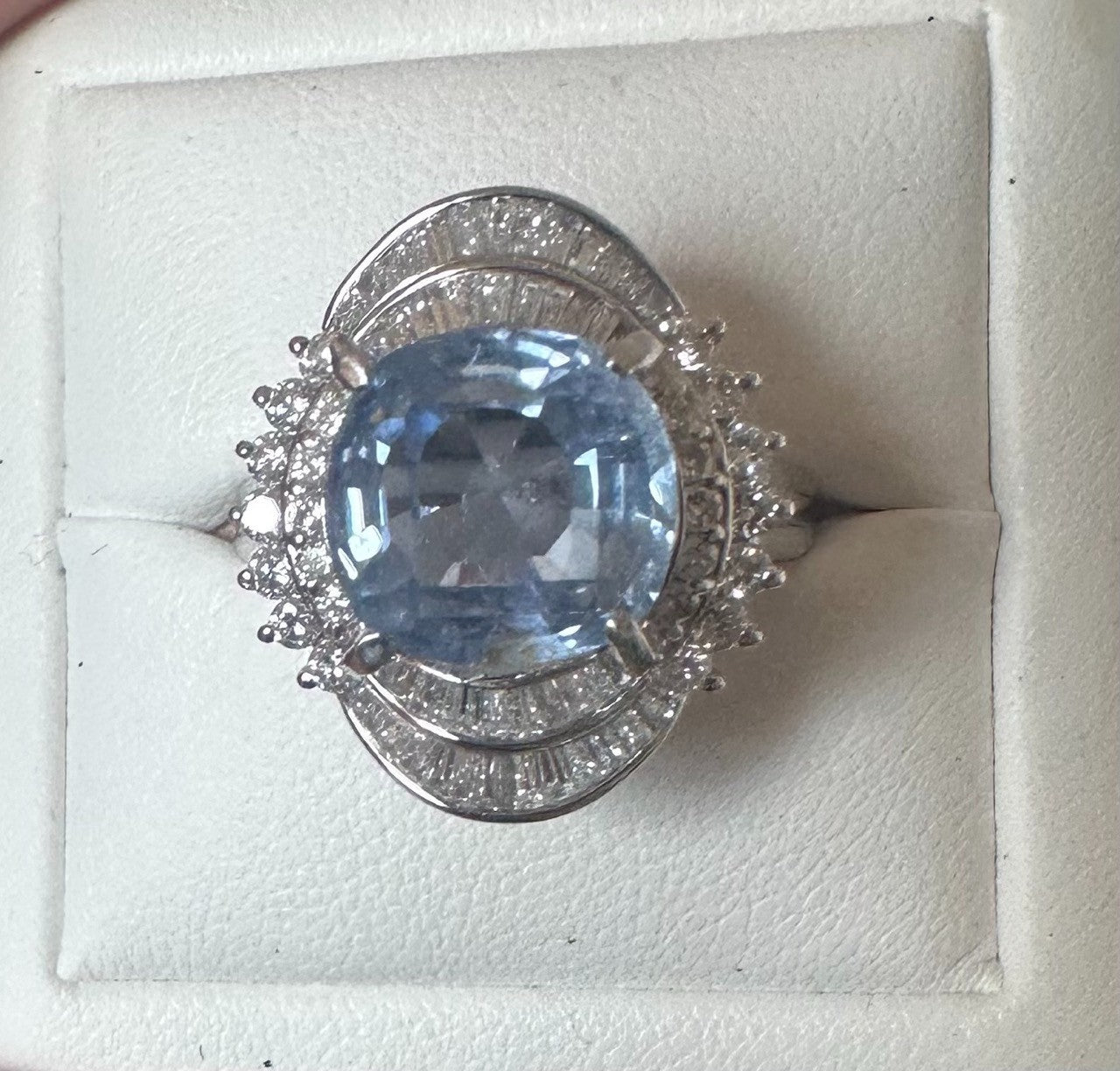 An Impressive Unheated 7.52ct Light Blue Sapphire Platinum & Diamond Ring