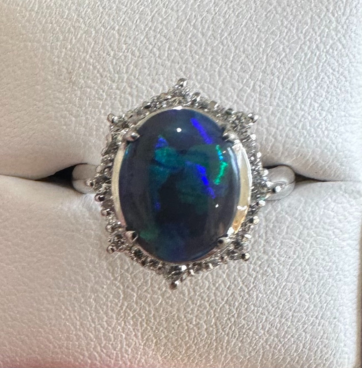 An Exquisite 2.35ct Australian Black Opal & Diamond Platinum Ring