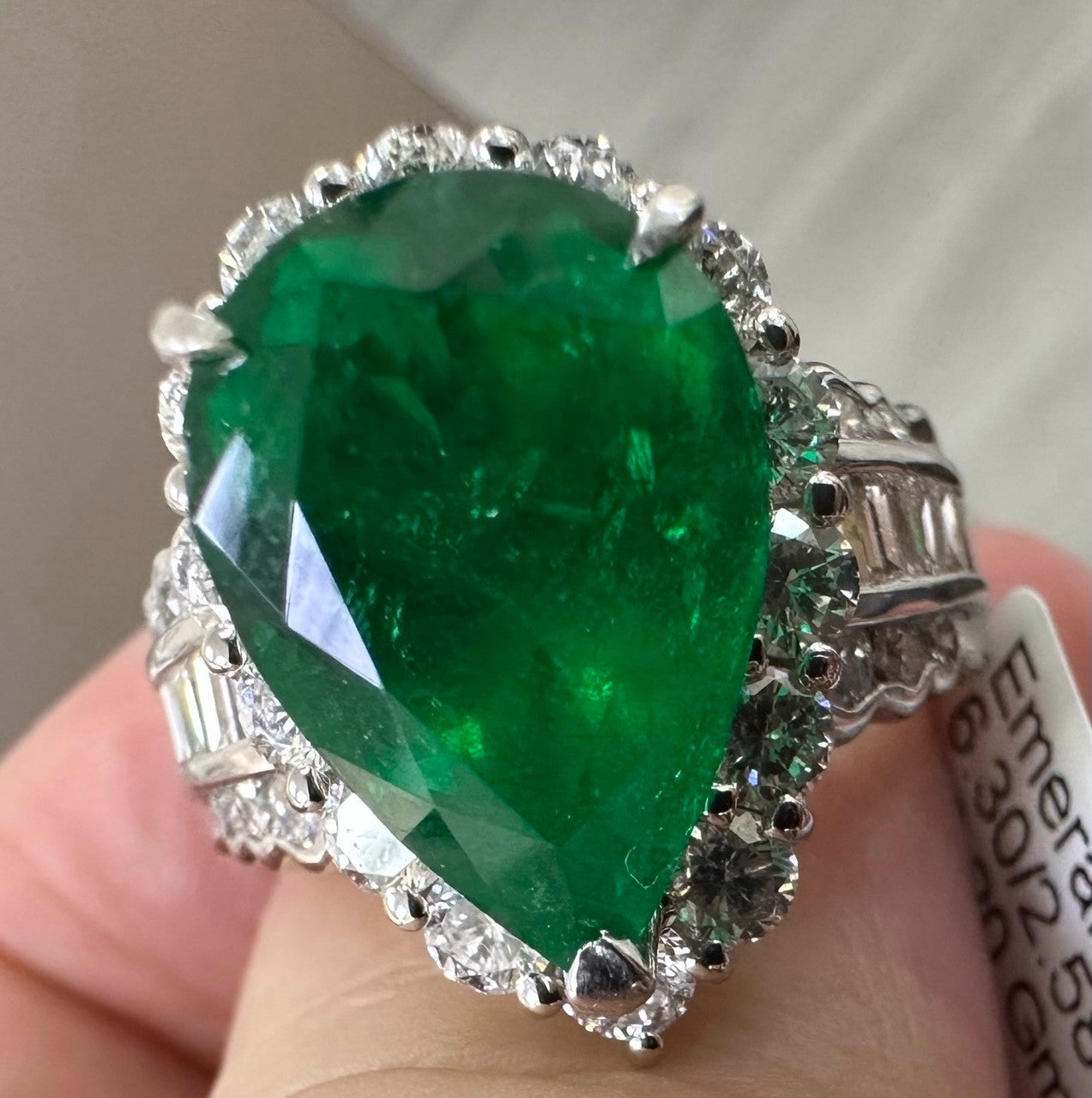 A Superb 6.30ct Muzo Colombia Emerald & Diamond Ring