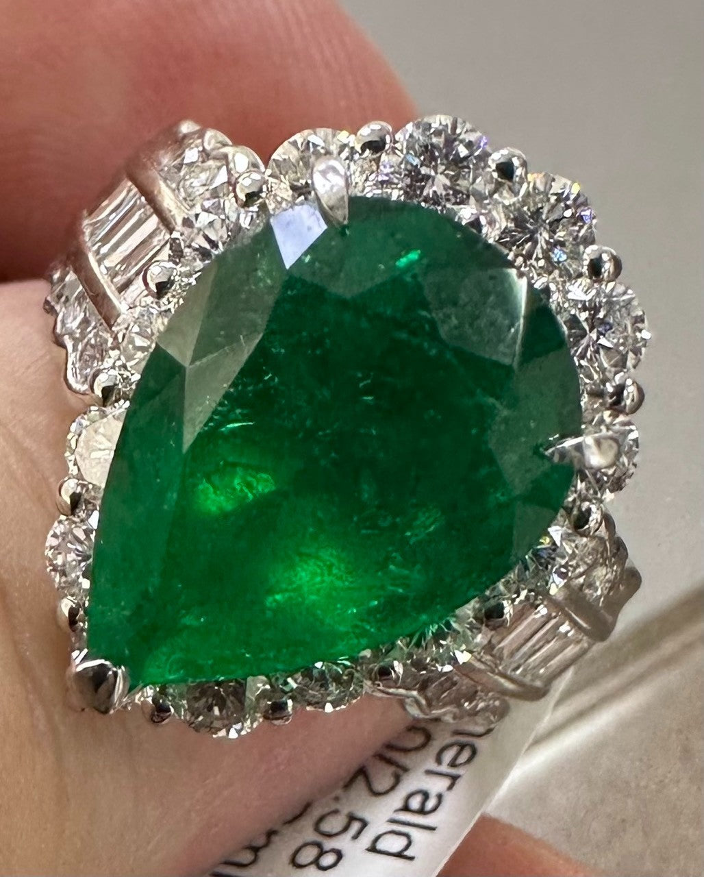 A Superb 6.30ct Muzo Colombia Emerald & Diamond Ring