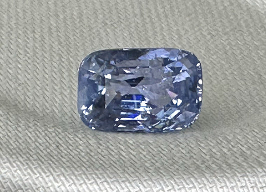 A Stunning Unheated 24.47ct Sri Lankan Violet Blue Sapphire