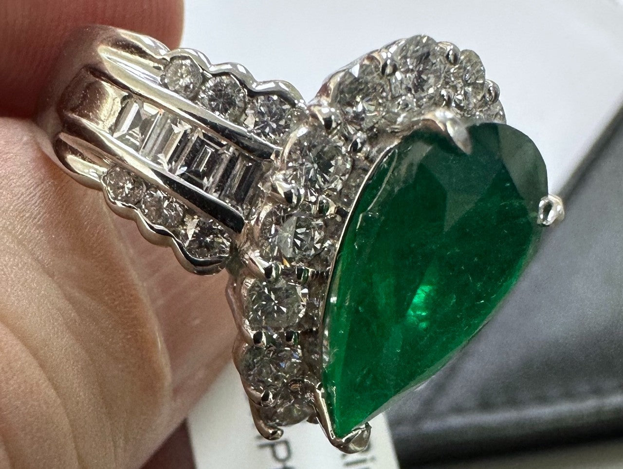 A Superb 6.30ct Muzo Colombia Emerald & Diamond Ring