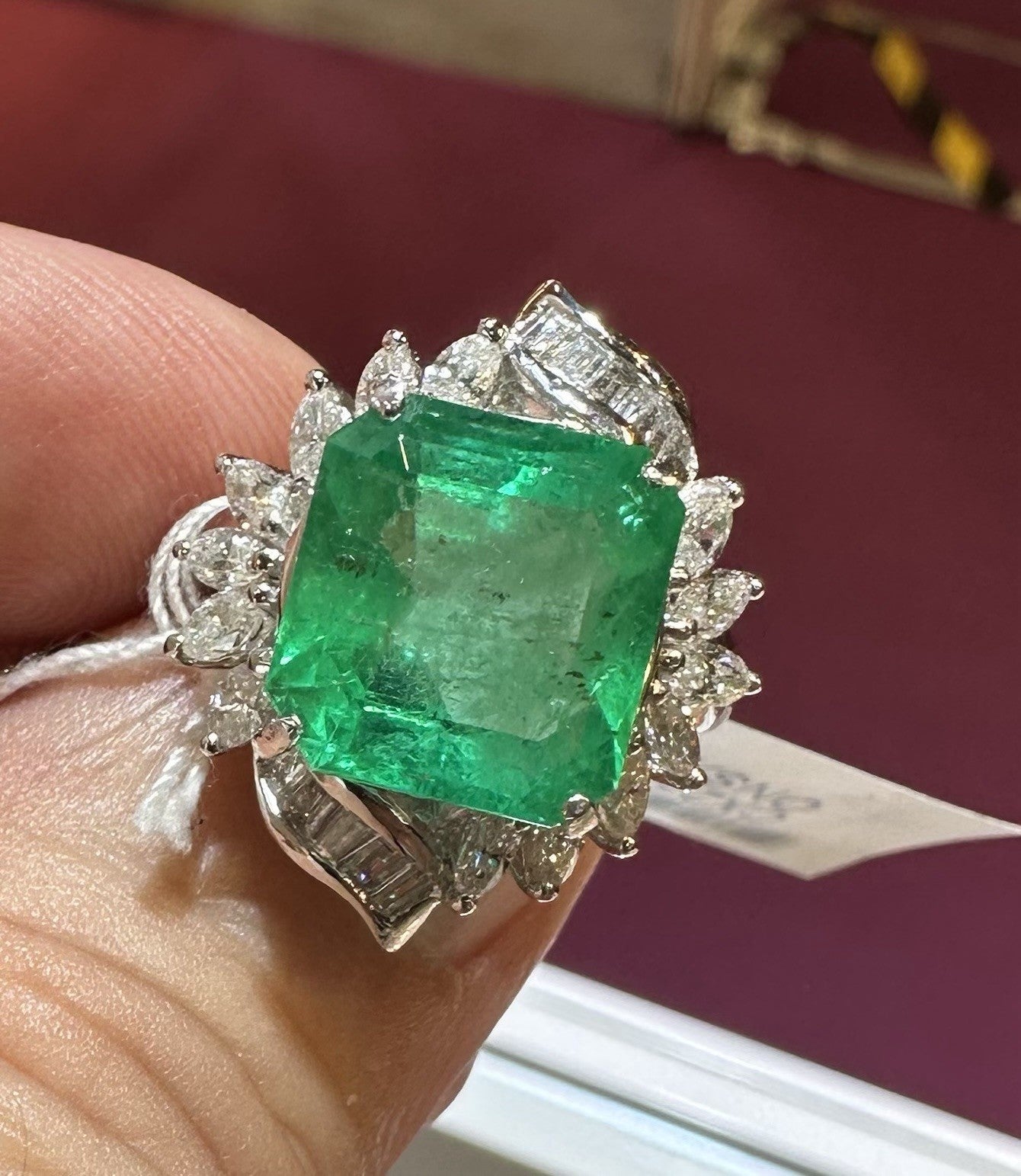 A Wonderful 6.76ct Colombia Emerald & Diamond Ring