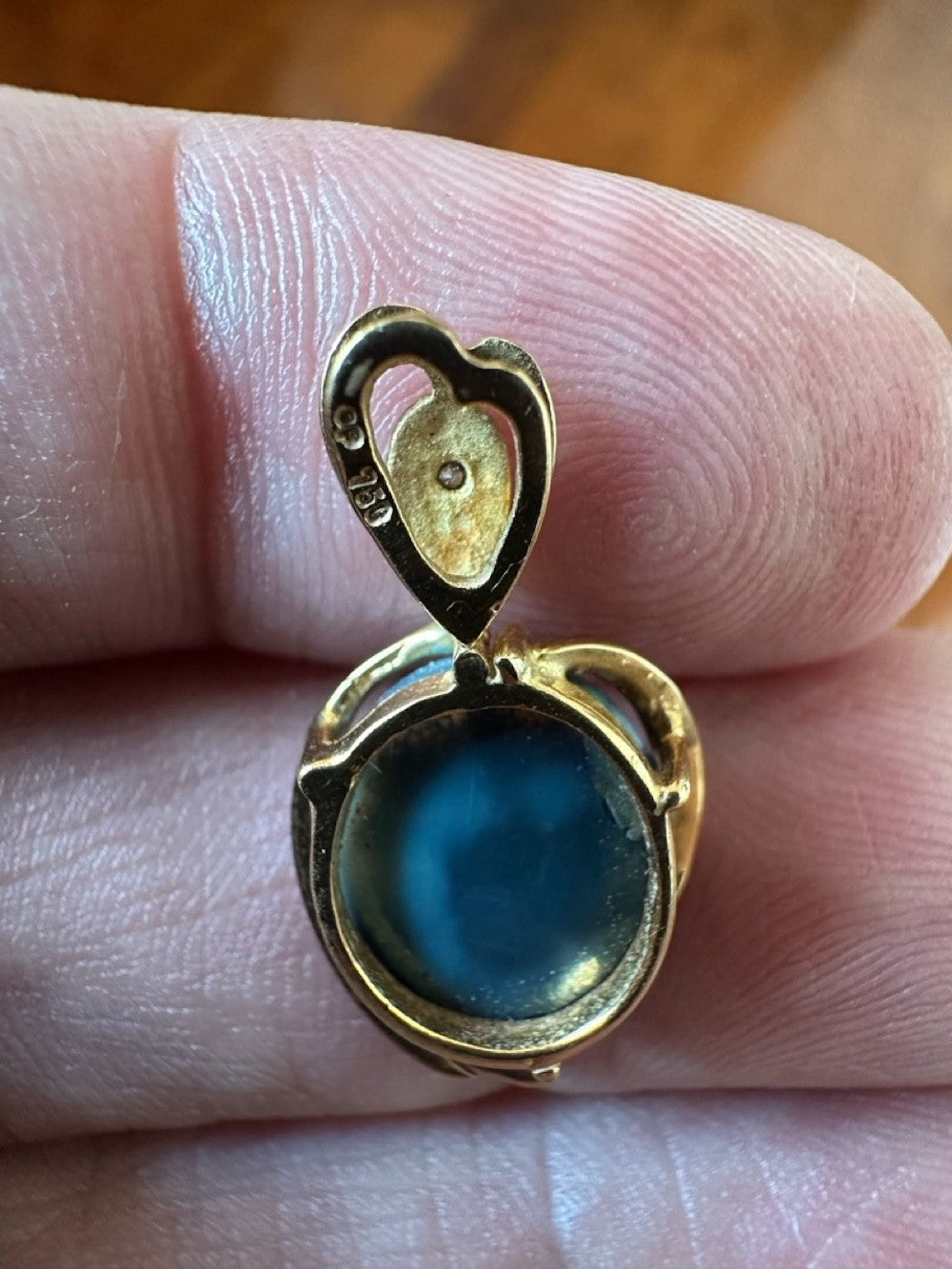 An Exquisite Australian Black Opal & Diamond 18k Pendant