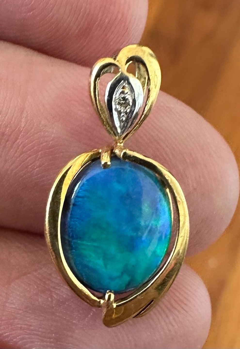 An Exquisite Australian Black Opal & Diamond 18k Pendant