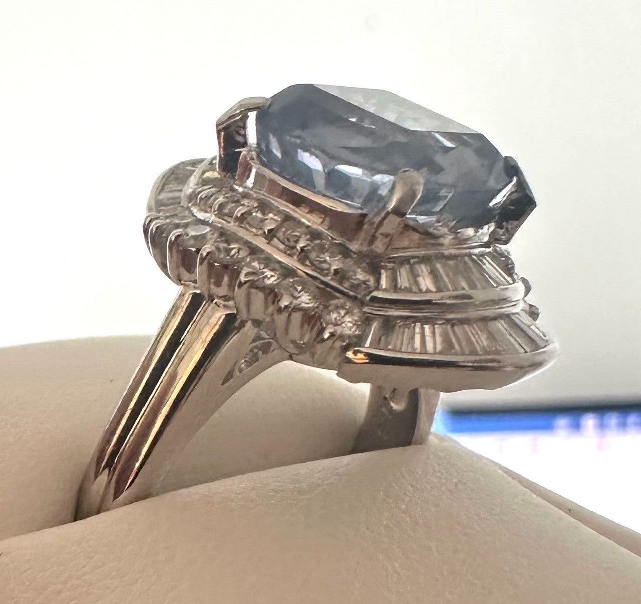 An Impressive Unheated 7.52ct Light Blue Sapphire Platinum & Diamond Ring