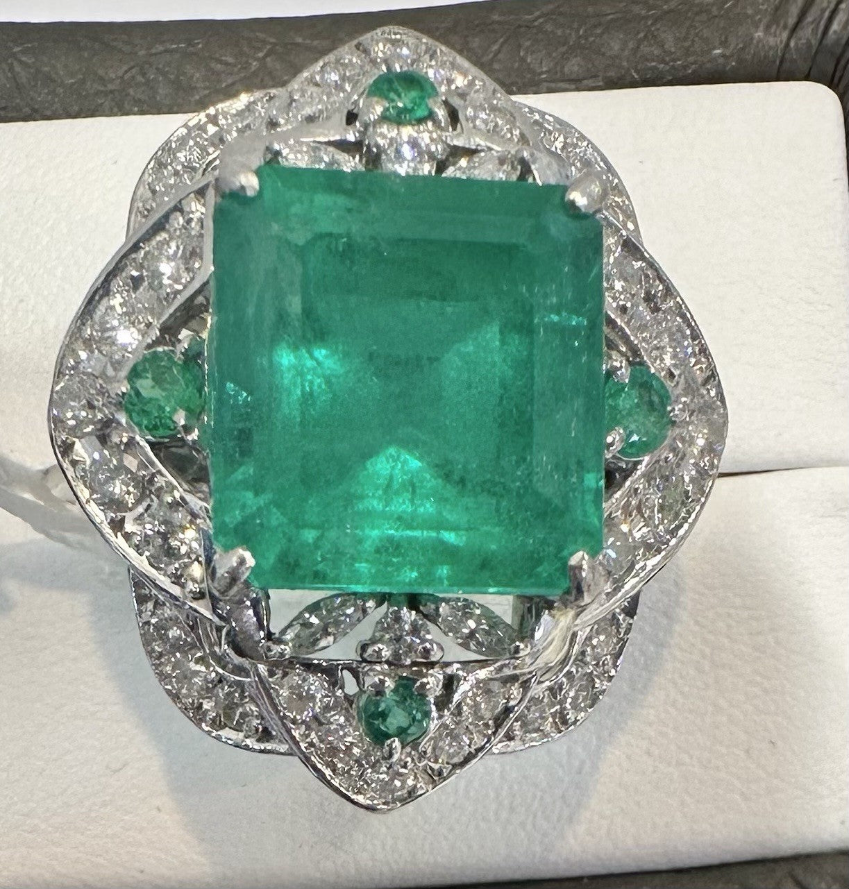 An Extraordinary 11.10ct Colombia Emerald & Diamond Platinum Ring