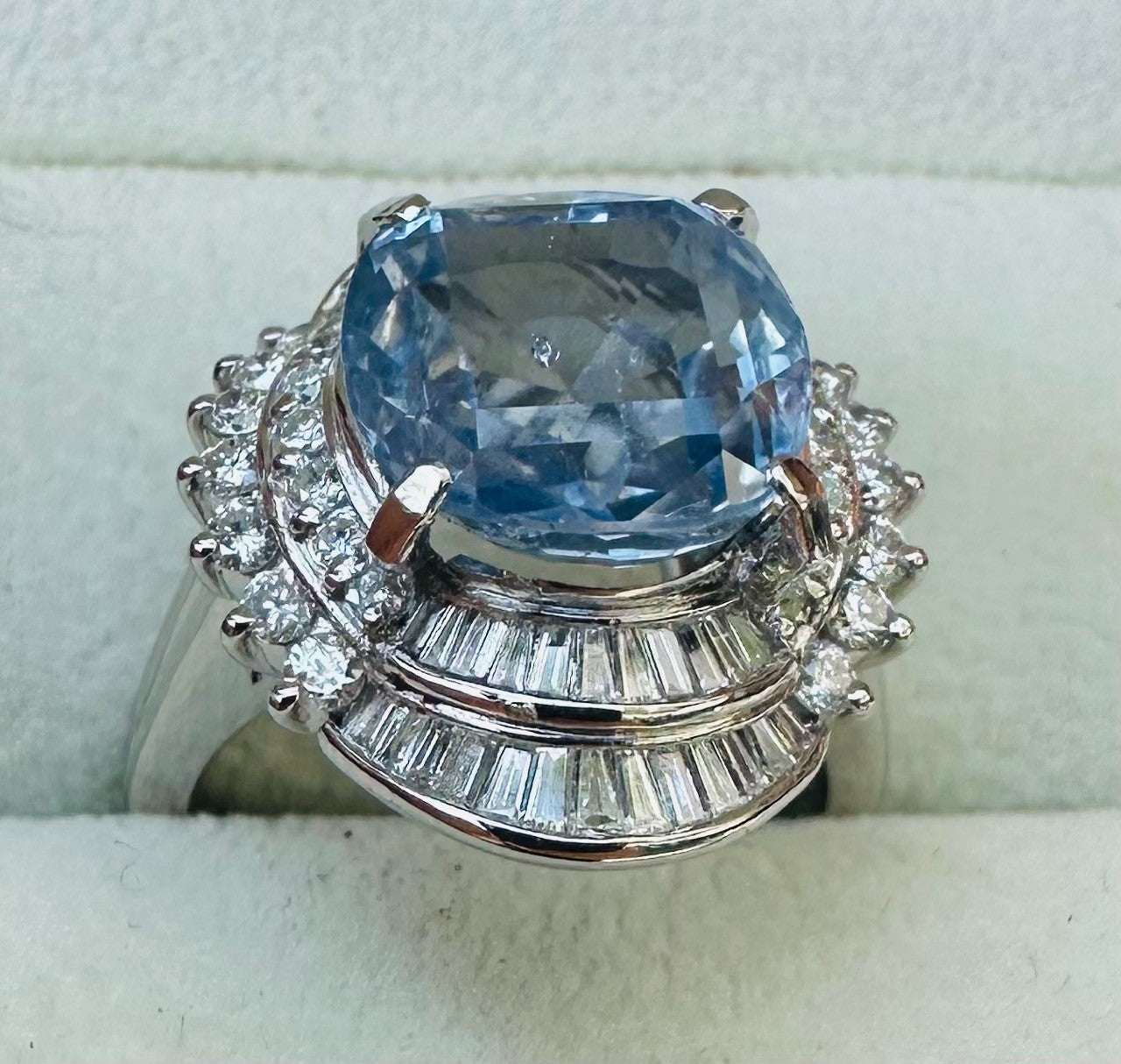 An Impressive Unheated 7.52ct Light Blue Sapphire Platinum & Diamond Ring