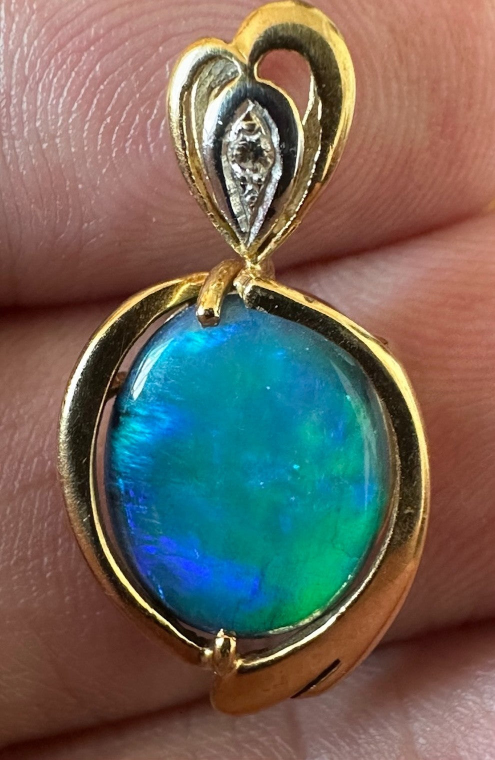 An Exquisite Australian Black Opal & Diamond 18k Pendant